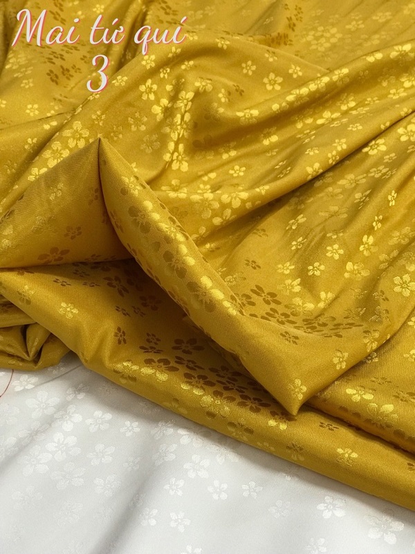 vải áo dài màu vàng đồng